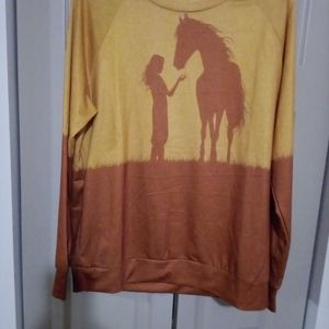 XL long sleeve shirt.  Silhouette of girl and horse. No labels and no info l